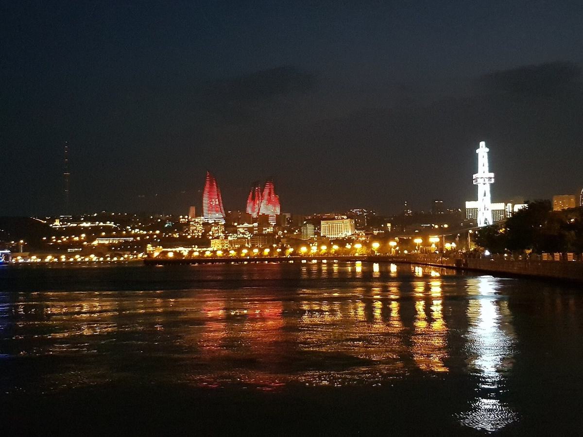 Baku at night: Flame Towers and the lights of the bay